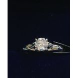 A MAPPIN & WEBB "ENA HARKNESS" PLATINUM AND DIAMOND RING, THE ROUND BRILLIANT CUT CLAW SET DIAMOND
