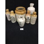 GROUP OF ASSORTED STONEWARE STORAGE POTS, MOST ADVERTISING GINGER BEER