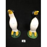 TWO PAINTED STONE MODELS OF PENGUINS, POSSIBLY DOORSTOPS, 31.5CM HIGH