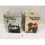 A SPARKLETS SODA SYPHON AND ANOTHER, BOTH BOXED