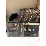 A COLLECTION OF 100 PLUS VINYL ALBUMS INCLUDING THE BEATLES, DAVID BOWIE, LOU REED AND MUCH MORE