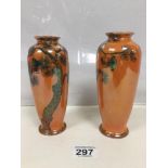 A PAIR OF WILKINSONS ORANGE LUSTRE GLAZED VASES WITH SCENES OF ORIENTAL TREES AND LANTERNS, 17.5CM