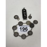 AN ANTIQUE CHARM BRACELET FORMED OF SILVER THREEPENCES, THE OLDEST COIN DATE 1893, TOGETHER WITH