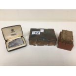 A RONSON VARAFLAME LIGHTER IN ORIGINAL BOX, TOGETHER WITH WHITE A METAL LIDDED BOX AND AN UNUSUAL