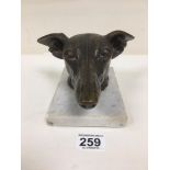 SALLY ARNUP (1930-2015) A BRONZE FIGURE OF A GREYHOUND OR WHIPPET HEAD, RAISED ON MARBLE BASE,