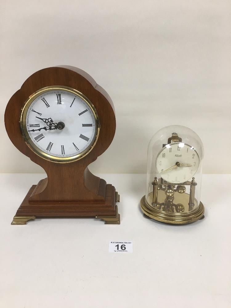 A KUNDO ANNIVERSARY CLOCK WITH DOME, MADE IN GERMANY, TOGETHER WITH A WOODEN CASED QUARTZ MANTLE