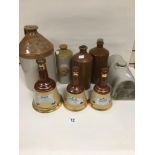 GROUP OF STONEWARE LIQUID CONTAINERS, INCLUDING WADE BELL'S WHISKY DECANTERS AND H CHOWN WINE &