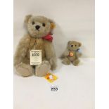 A STEIFF ORIGINAL TEDDY BEAR REPLICA 1909, NUMBER 406225, TOGETHER WITH A SIMILAR SMALLER BEAR