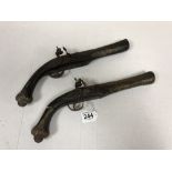 TWO EARLY FLINTLOCK PISTOLS WITH INLAID BRASS WIRE DETAILING THROUGHOUT AND FLARED BARRELS, ONE AF