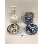 FOUR CERAMIC ITEMS, INCLUDING A RETICULATED PIERCED VASE OF BALUSTER FORM, A CARTER STABLER ADAMS