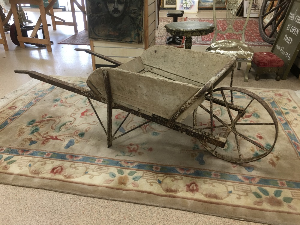 VINTAGE FRENCH WOODEN AND METAL FRAMED WHEELBARROW