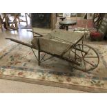 VINTAGE FRENCH WOODEN AND METAL FRAMED WHEELBARROW