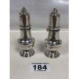 A PAIR OF SILVER SALT AND PEPPER POTS OF BALUSTER FORM, HALLMARKED LONDON 1987 BY W I BROADWAY & CO,