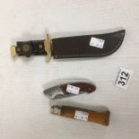 TWO VINTAGE FOLDING KNIVES AND ANOTHER KNIFE IN SHEATH