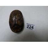 A CARVED STONE FIGURE OF A SCARAB BEETLE, THE BASE WITH EGYPTIAN HIEROGLYPHS, 8.5CM BY 5CM