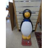 A VINTAGE ICE SKATING AID IN THE FORM OF A PENGUIN, 76CM HIGH