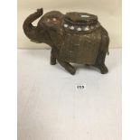 AN EARLY INDIAN CARVED HARD WOOD FIGURE OF AN ELEPHANT WITH INTRICUT APPLIED BRASS DETAILING