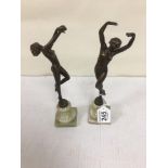 A PAIR OF ART DECO BRONZE FIGURES OF DANCING LADIES, RAISED UPON MARBLE BASES, INDISTINCTLY