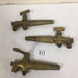 THREE VINTAGE BRASS ALE KEG TAPS