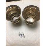 A PAIR OF EARLY 20TH CENTURY SILVER BEAKERS WITH FLARED RIMS, HALLMARKS RUBBED, 82G