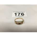 AN EARLY 20TH CENTURY 18CT GOLD RING SET WITH TWO RED STONES, HALLMARKED BIRMINGHAM 1914, 2.54G