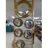 SIX BRASS MOUNTED PORTHOLE MIRRORS, FIVE SMALL AND ONE LARGE, 26CM AND 48CM IN DIAMETER