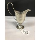 A GEORGE III SILVER HELMET SHAPED CREAM JUG, HALLMARKED LONDON 1782, MAKERS MARK RUBBED, 133G