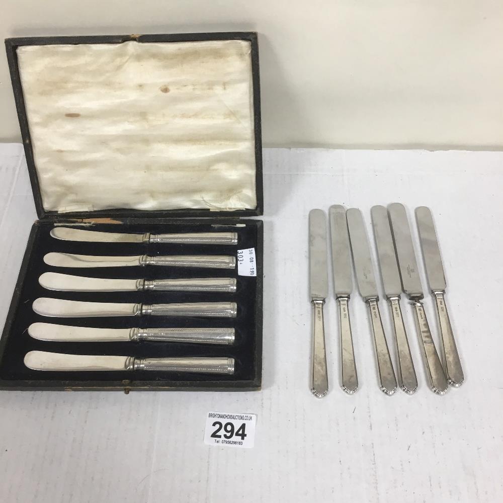 TWO SETS OF SIX HALLMARKED SILVER HANDLED TEA KNIVES, ONE SET CASED