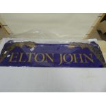 AN ELTON JOHN ADVERTISING DISPLAY PIECE, 101CM WIDE