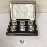 A SET OF SIX SILVER NAPKIN RINGS WITH ENGRAVED INITIALS TO THE FRONT, HALLMARKED BIRMINGHAM 1918
