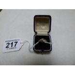 A LATE 19TH/EARLY 20TH CENTURY 18CT YELLOW GOLD RING SET WITH TWO OLD BRILLIANT CUT DIAMONDS, BOXED,
