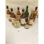 NUMEROUS BOTTLES OF BLENDED SCOTCH WHISKY, INCLUDING VAT 69 1 LITRE, BELLS 8 YEARS 1 LITRE AND MORE
