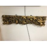 A CARVED WOODEN GILT WALL PLAQUE OF BIRDS AMONGST BRANCHES, 103CM WIDE