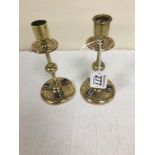 A PAIR OF BRASS CANDLESTICKS, EACH MOUNTED WITH THREE POLISHED CABOCHON AGATES, 16.5CM HIGH