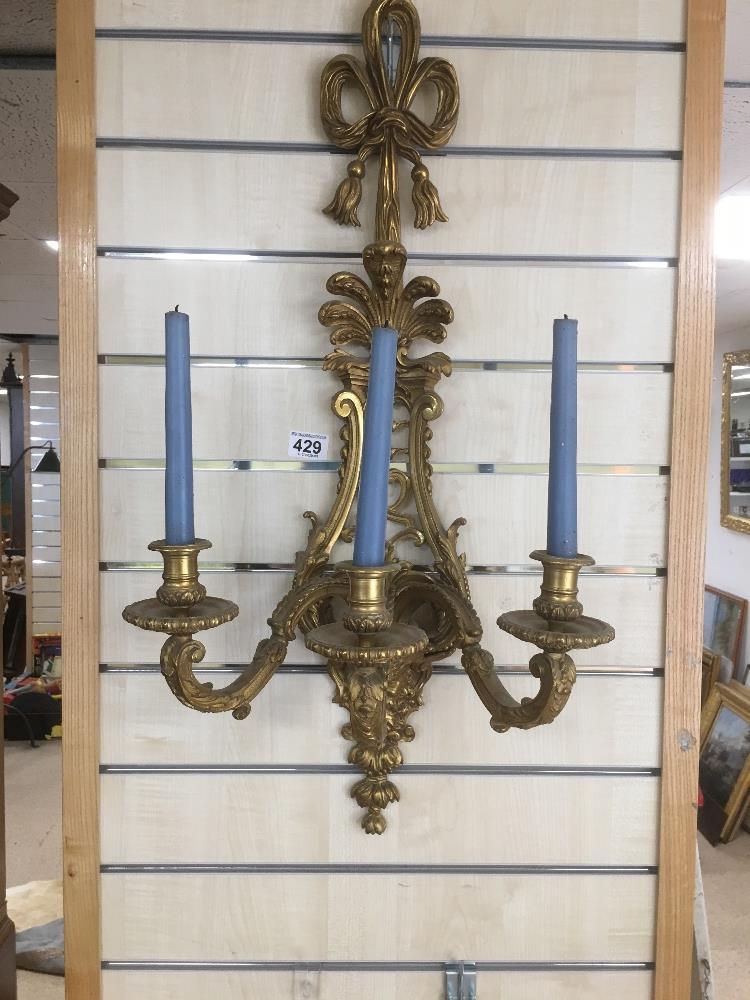 A PAIR OF GILT METAL THREE BRANCH WALL SCONCES, 80CM HIGH