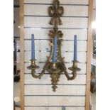 A PAIR OF GILT METAL THREE BRANCH WALL SCONCES, 80CM HIGH