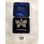 A LARGE 850 GRADE SILVER BUTTERFLY BROOCH, TOGETHER WITH ANOTHER SILVER BROOCH WITH BLUE ENAMEL