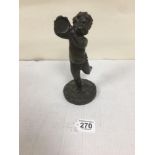 A 19TH CENTURY BRONZE FIGURE OF A PUTTI HOLDING A TAMBOURINE, UNSIGNED, 22CM HIGH