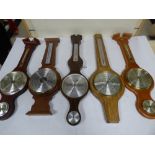 FIVE WOOD CASED WALL BAROMETERS, INCLUDING ONE BY COMITTI OF LONDON (SOME AF)