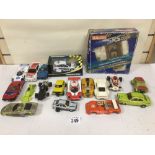 A COLLECTION OF VINTAGE SCALEXTRIC VEHICLES, INCLUDING PORCHE, MINI'S, RACING CARS AND MORE
