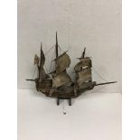 A VINTAGE WOODEN MODEL OF A PIRATE SHIP ON STAND, 60CM LONG