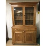 A VICTORIAN PINE DRESSER, RAISED UPON FOUR FEET, 210CM HIGH BY 126CM WIDE