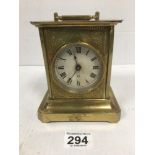 A LATE 19TH CENTURY BRASS CASED CARRIAGE CLOCK, THE CIRCULAR DIAL WITH ROMAN NUMERALS DENOTING