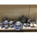 LARGE COLLECTION OF BLUE AND WHITE CHINA. WILLOW PATTERN AND OTHERS