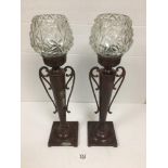 A PAIR OF BRONZE TABLE LAMPS SHAPED AS TWIN HANDLED VASES WITH GLASS SHADES, 54.5CM HIGH