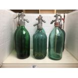 SIX VINTAGE GREEN GLASS SODA SYPHONS