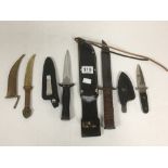 THREE KNIVES IN SHEATHS, LARGEST 30.5CM LONG, TOGETHER WITH A BRASS MIDDLE EASTERN STYLE LETTER