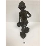 A BRONZE FIGURE OF A BOY WEARING A HAT AND CARRYING A BASKET, SIGNED TO BASE "MARTIN", 38CM HIGH