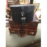 TWO LEATHER SUITCASES WITH A VINTAGE ANTLER VANITY CASE