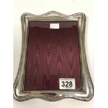 A BRITANIA SILVER PHOTO FRAME OF RECTANGULAR FORM, HALLMARKED LONDON 2003 BY PAUL VERNON FITCHIE,